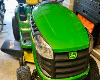 John Deere D130 Riding Lawnmower. Almost new, 50 hours. 