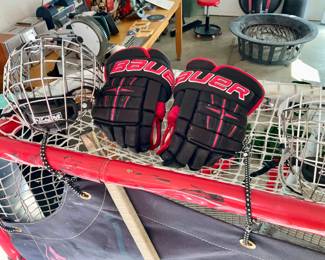 Hockey , net, hockey gear, hockey sticks,   hockey goalie gear