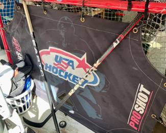 Hockey , net, hockey gear, hockey sticks,   hockey goalie gear
