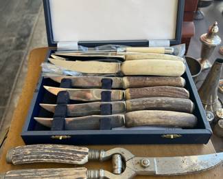 Stag steak knives and serving pieces from Scully and Scully in NYC.