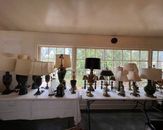 An assortment of lamps, most with a partner. 