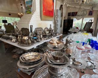 Silver, glassware, and art everywhere. 