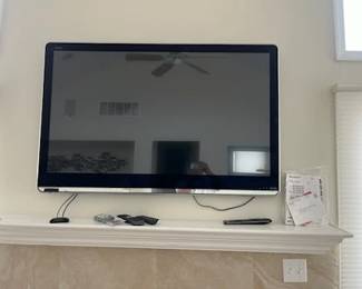 Flat screen TV with wall mount