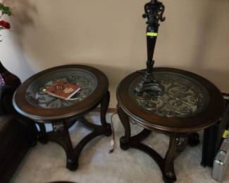 There are 3 of these metal and wood glass top tables