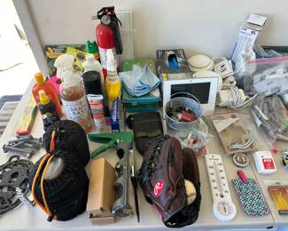 Variety of tools and household supplies