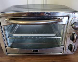Oster Electric Toaster Oven, Model TSSTTV0001, Powers On 