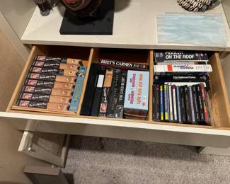 Assorted vhs tapes and cds