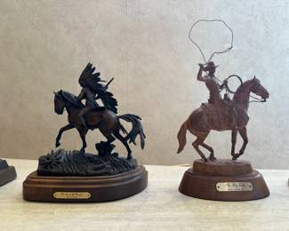 Bronze statues : The Trail of Change by Ken Payne and The Big Loop by Mehl Lawson