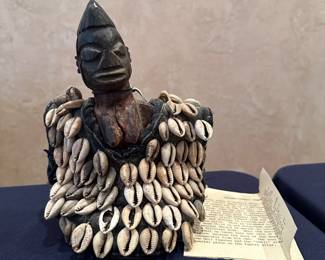 Yoruba 'Ibeji'  figure in a cowrie shell covered garment, Nigeria