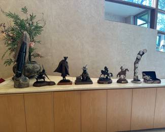 African Carved Statue (1 piece), Native American bronze warrior, Hopi Maiden bronze by Boomer, Joe Oreland bronze,  'The Trail of Change' bronze by Ken Payne, 'The Big Loop' by Mehl Lawson, Intuit Totem sculpture by Kent Heindel 