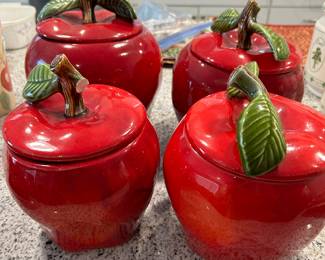 4 PIECE APPLE CANISTER SET.