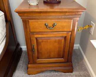 A PAIR OF BEDSIDE  TABLES.