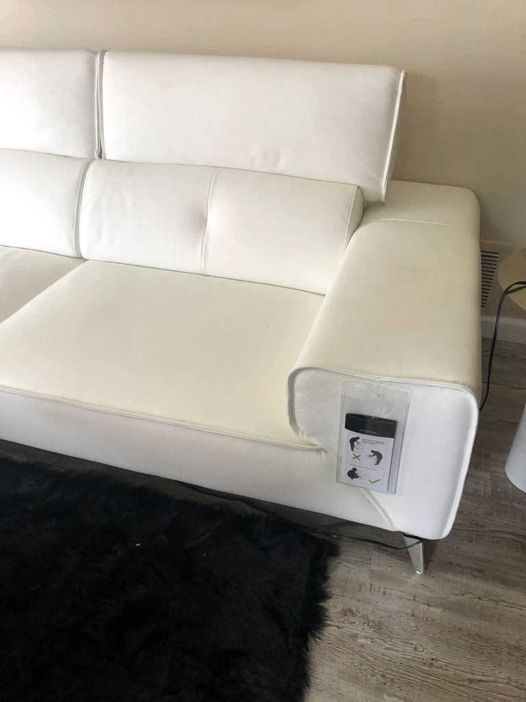 NEW WHITE LEATHER SECTIONAL