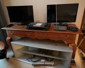 Sofa table, televisions
