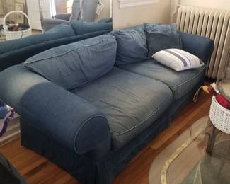 Cozy sofa with denim slipcover