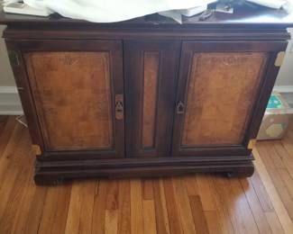 Stylish breakfront with Asian-inspired hardware