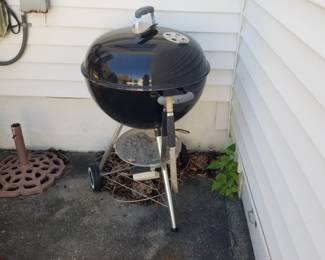 Weber charcoal grill; umbrella stand