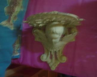 Cast iron shelf with angel