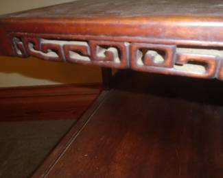 carvings on end tables