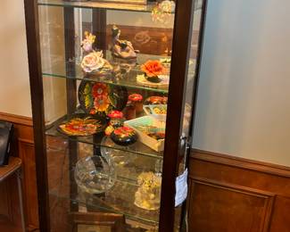 Elegant lighted sliding glass front display cabinet