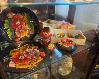Black lacquer plates, nesting dolls, mushroom