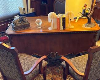 Elegant desk, chairs, book ends