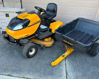 Cub cadet riding mower with trailer and snow plow blade brand new in the box