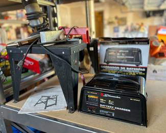 Battery charger, table saw