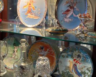 Crystal decanters, oriental plates