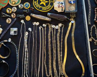 Necklaces, patches, medals, knives, jewelry