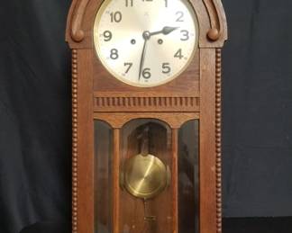 Lot # : 52 - Tall wood Parzival Gong Stabe 4. wall clock
