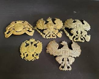 Lot # : 446 - Group of military helmet emblems