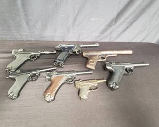 Lot # : 356 - Box of vintage air guns, cap guns, and prop gun