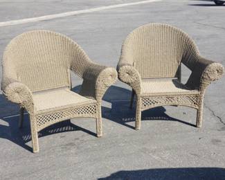 Lot # : 648 - Pair of wicker style patio chairs