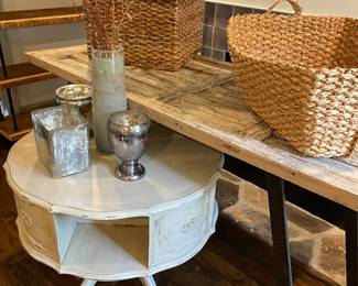 Ivory Swivel Library Table, Baskets and Mercury Glass Decor. Table behind is an iron base with Custom Door attached for the top. 