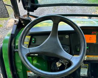 DIESEL JOHN DEERE GATOR 855D 4X4 SIDE-BY-SIDE WITH DUMP BED | 855D John Deere side-by-side with enclosed cab with glass doors, power steering, four-wheel-drive, dump bed 10,179 miles no warning lights. All systems appear to function some accessory wires battery mounting in the front for a plow.

If you are interested in seeing the gator please email, call, or text Alex the Auction Manager alex@aces.net / (475) 500-7075