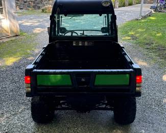 DIESEL JOHN DEERE GATOR 855D 4X4 SIDE-BY-SIDE WITH DUMP BED | 855D John Deere side-by-side with enclosed cab with glass doors, power steering, four-wheel-drive, dump bed 10,179 miles no warning lights. All systems appear to function some accessory wires battery mounting in the front for a plow.

If you are interested in seeing the gator please email, call, or text Alex the Auction Manager alex@aces.net / (475) 500-7075