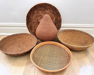 5 Vintage Hand Woven Baskets Including Native American Water Jug Purchased For $495 In 1991
Lot #: 57