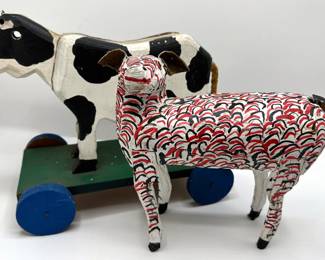 Vintage Folk Art Animals: Cow On Wheels & Dog
Lot #: 178