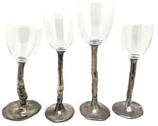 Set 4 Hand Made Wine Glasses With Metallic Painted Ceramic Stems Purchased At Donna Karan's Urban Zen Store
Lot #: 117