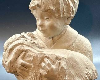 Vintage 1981 Austin Sculpture of Child Holding a
Newborn