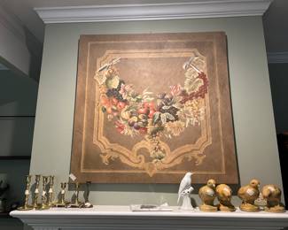 Mantle in Living room - brass candle holders - carved birds on right - great picture!