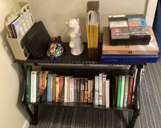 Same shelf - cassette tapes, National Geographic magazines, decor and books