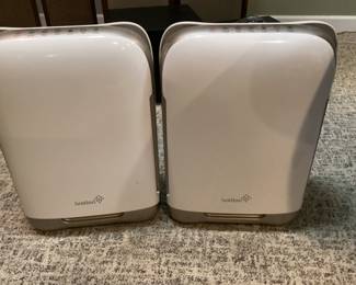 Two air purifiers with filters (sold separately)
