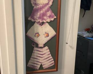 Office closet - Picture  contains vintage crochet items under glass
