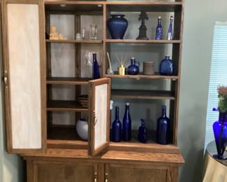 Hand made shelving unit.  Was used as a room divider-opens on both sides.