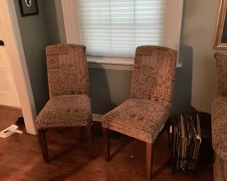 Two miscellaneous chairs in living room - magazine rack