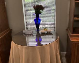 Round glass top table 