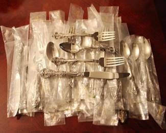 131 - 49 pc. Oneida Stainless Silverware Set
