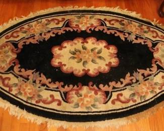 56 - Oval Sculptured Rug - 65" x 40"
